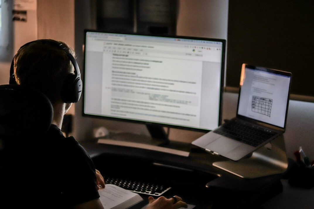 data analyst working on computer